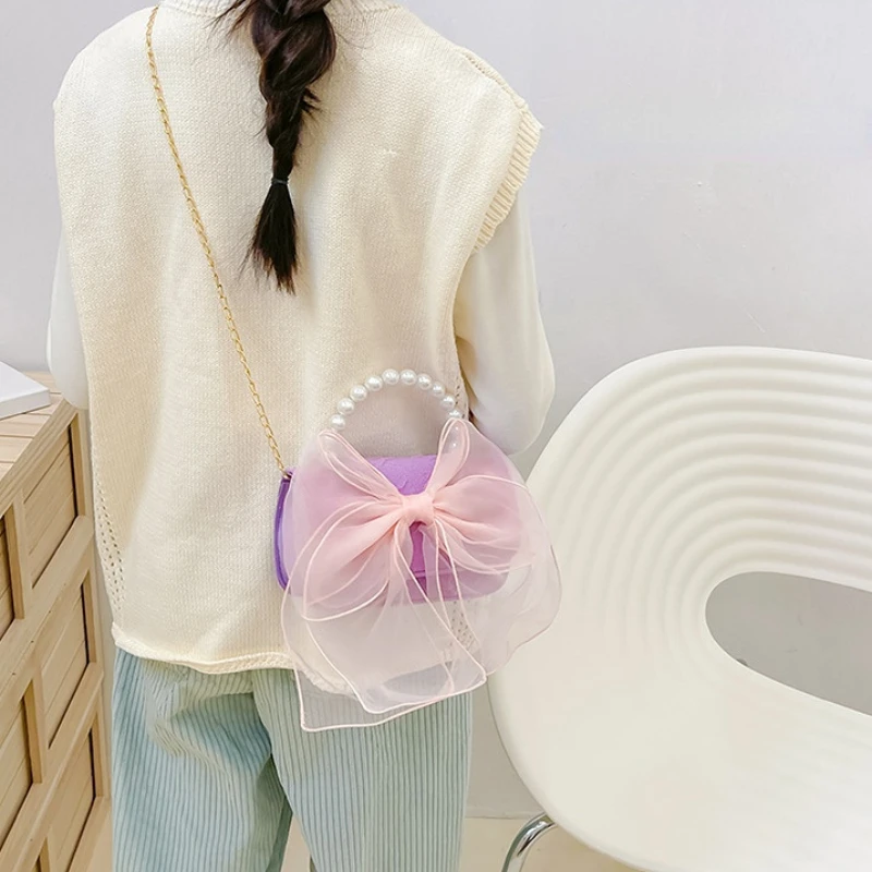 2023 Новые детские мини-сумки-тоут, милые сумки через плечо с кружевным бантом для маленьких девочек, мешочек для монет, жемчужная ручная сумка для малышей