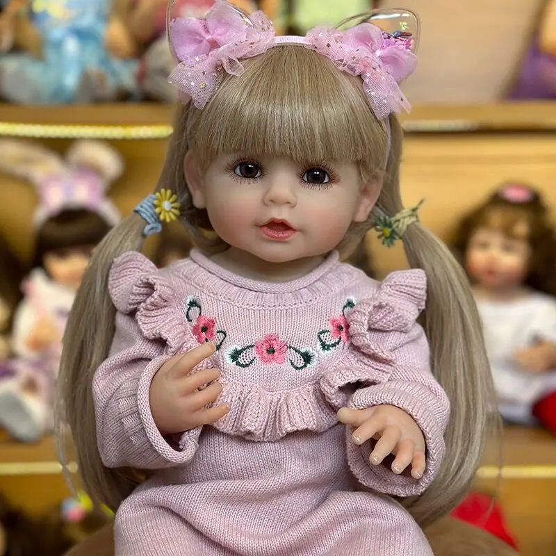 NPK 55 см Полностью силиконовая кукла Reborn Smile Baby Doll Дети для девочек Реалистичные светлые волосы Мягкие на ощупь Высококачественные кукольные подарки