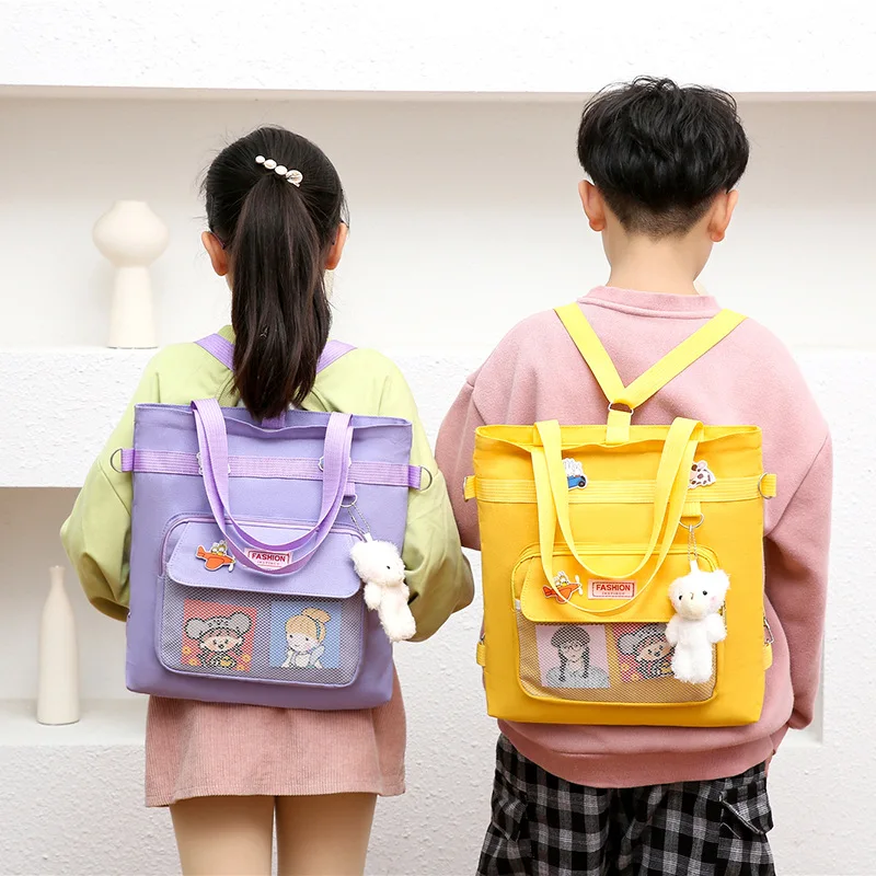 Сумка для переноски для учащихся начальной школы может быть двойной наплечной сумкой для документов, холщовой художественной сумкой формата А4, сумкой для учебных занятий, утолщенной